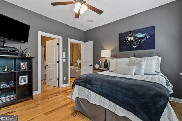 37 Retreat Rdg, Cartersville, GA 30120 - bedroom featuring wood finished floors, a ceiling fan, and ensuite bathroom