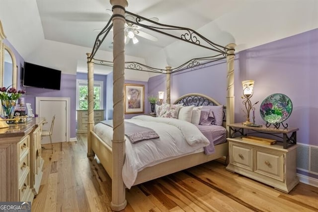 37 Retreat Rdg, Cartersville, GA 30120 - bedroom featuring light wood-style flooring, vaulted ceiling, and a ceiling fan