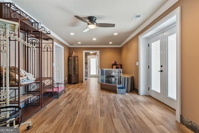 37 Retreat Rdg, Cartersville, GA 30120 - foyer with ceiling fan, light wood-type flooring, crown molding, plenty of natural light, and recessed lighting