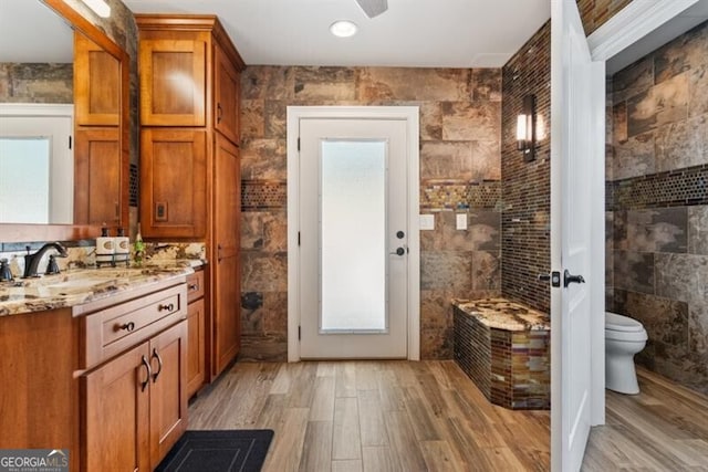 37 Retreat Rdg, Cartersville, GA 30120 - full bathroom featuring wood finished floors, vanity, and ceiling fan