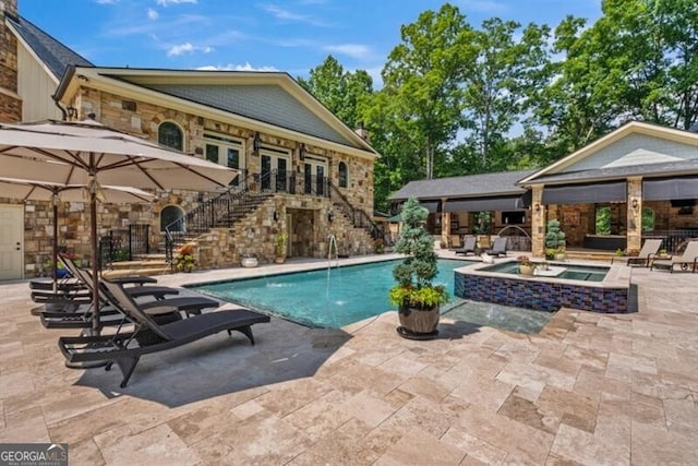 37 Retreat Rdg, Cartersville, GA 30120 - view of swimming pool with stairway, a patio area, a pool with connected hot tub, and french doors