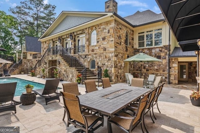 37 Retreat Rdg, Cartersville, GA 30120 - view of patio with stairway and outdoor dining space