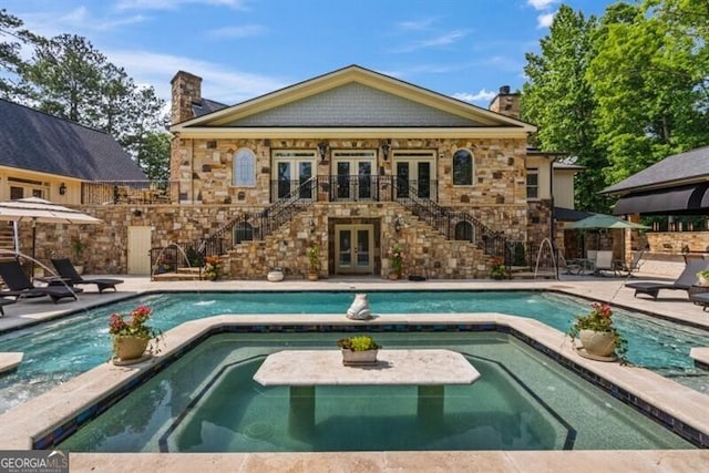37 Retreat Rdg, Cartersville, GA 30120 - view of pool with french doors, stairway, a pool with connected hot tub, and a patio