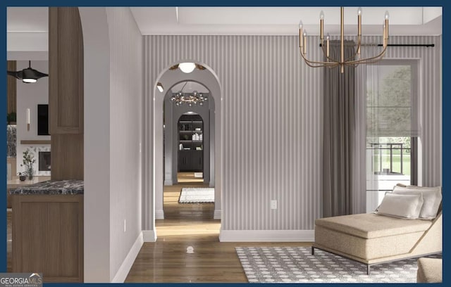 0 Ebenezer Rd Unit 4, Fayetteville, GA 30215 - hall featuring a chandelier, arched walkways, dark wood-style flooring, and baseboards