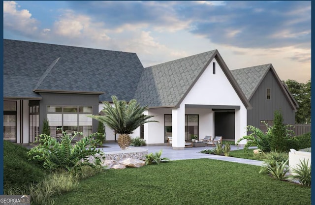0 Ebenezer Rd Unit 4, Fayetteville, GA 30215 - back of house featuring a lawn, a patio, and roof with shingles