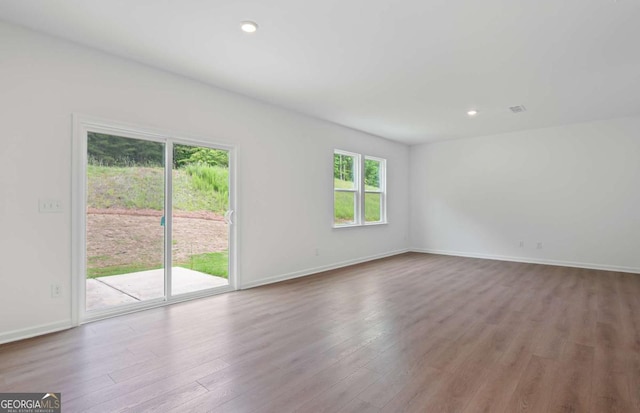 3044 Orwell Dr, Gainesville, GA 30507 - unfurnished room with wood finished floors, baseboards, and recessed lighting