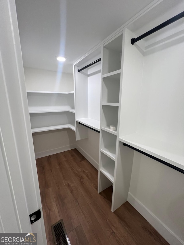 1227 Kenilworth Dr SW, Atlanta, GA 30310 - spacious closet featuring dark wood finished floors