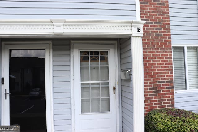 636 N Ave Unit 11E, Jonesboro, GA 30236 - property entrance featuring brick siding