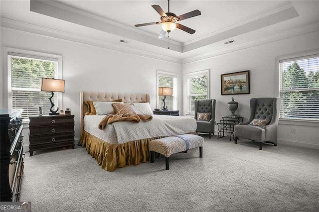 715 Creekside Bnd, Alpharetta, GA 30004 - bedroom with a tray ceiling, ornamental molding, light colored carpet, a ceiling fan, and baseboards