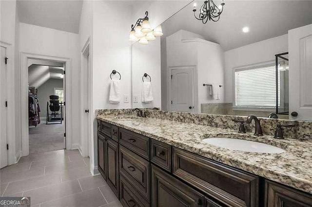 715 Creekside Bnd, Alpharetta, GA 30004 - bathroom featuring vaulted ceiling, a chandelier, double vanity, and tile patterned flooring