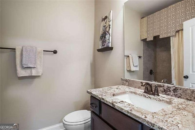 715 Creekside Bnd, Alpharetta, GA 30004 - bathroom featuring vanity, toilet, a shower with curtain, and baseboards