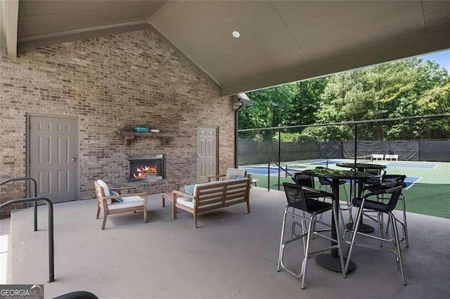 715 Creekside Bnd, Alpharetta, GA 30004 - view of patio / terrace featuring an outdoor living space with a fireplace