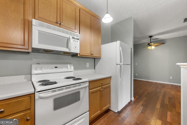 1995 Liberty Hts, Fairburn, GA 30213 - kitchen featuring white appliances, dark wood finished floors, a ceiling fan, light countertops, and pendant lighting