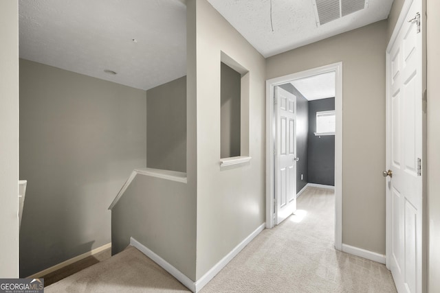 1995 Liberty Hts, Fairburn, GA 30213 - hallway featuring carpet flooring, baseboards, and an upstairs landing