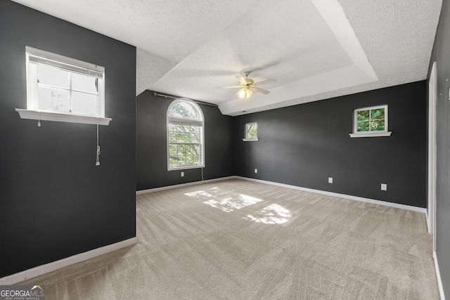 1995 Liberty Hts, Fairburn, GA 30213 - carpeted spare room with a textured ceiling, ceiling fan, and baseboards