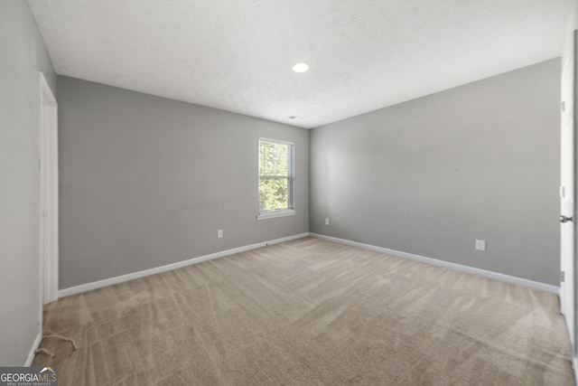 1995 Liberty Hts, Fairburn, GA 30213 - unfurnished room featuring light colored carpet, baseboards, and recessed lighting