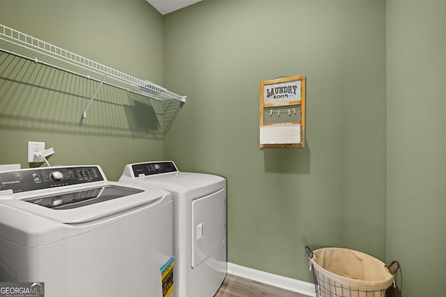 2690 Ravencliff Dr, Austell, GA 30168 - washroom with washer and dryer, baseboards, and wood finished floors