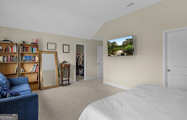 935 Abode Ave, Fort Stewart, GA 31313 - carpeted bedroom featuring a spacious closet, baseboards, and lofted ceiling