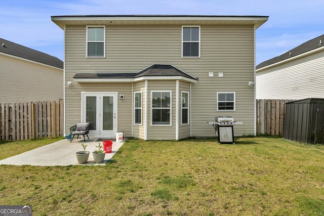 935 Abode Ave, Fort Stewart, GA 31313 - rear view of property with a patio area