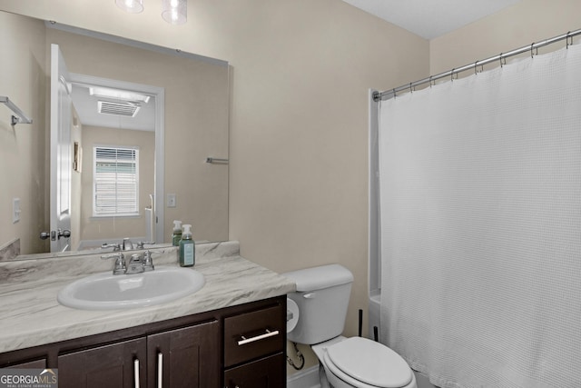 935 Abode Ave, Fort Stewart, GA 31313 - bathroom featuring toilet, vanity, and shower / tub combo