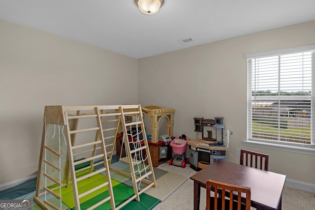 935 Abode Ave, Fort Stewart, GA 31313 - carpeted bedroom featuring baseboards