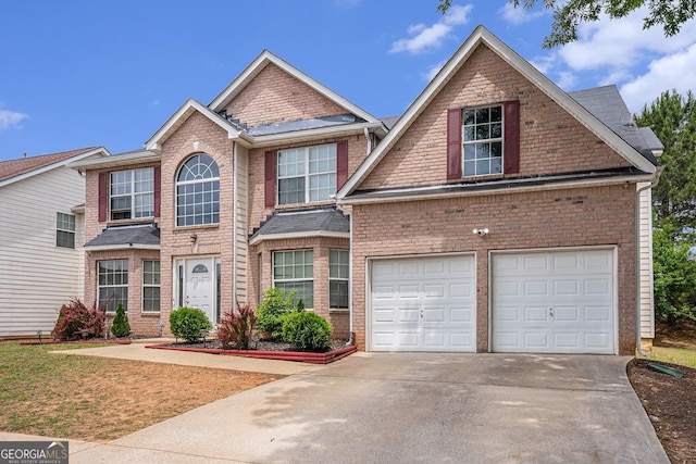 3740 Arminto Dr, Ellenwood, GA 30294 - view of front of property with concrete driveway, a garage, and brick siding