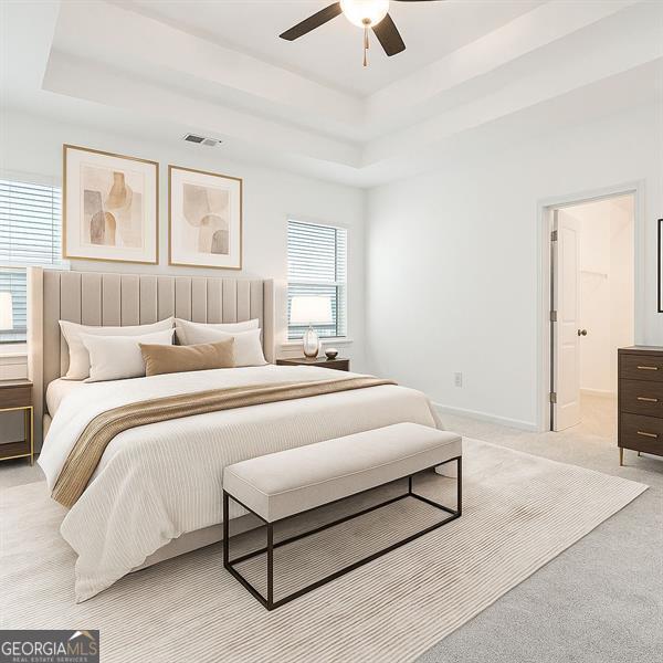 3514 Ambassador Aly, Scottdale, GA 30079 - bedroom with a raised ceiling, light colored carpet, and ceiling fan