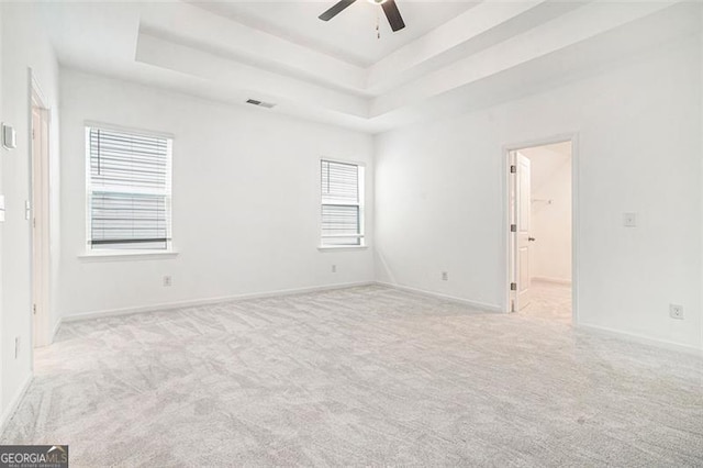 3514 Ambassador Aly, Scottdale, GA 30079 - carpeted empty room featuring a tray ceiling, a ceiling fan, and baseboards
