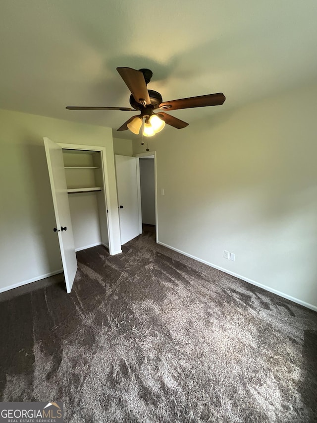 1776 Smokey Rd, Lagrange, GA 30241 - unfurnished bedroom with carpet floors, baseboards, and a ceiling fan