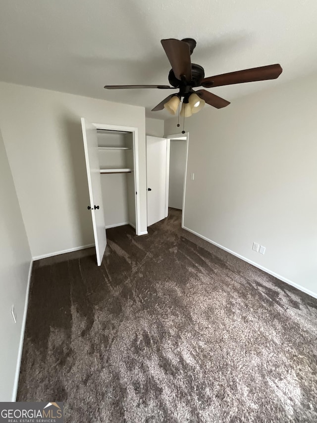 1776 Smokey Rd, Lagrange, GA 30241 - unfurnished bedroom with carpet flooring, ceiling fan, and baseboards