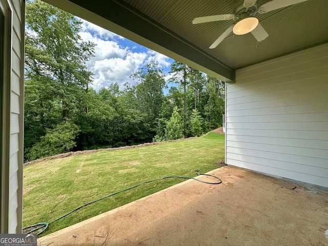 7040 Manchester Dr, Flowery Branch, GA 30542 - view of green lawn featuring a patio area and ceiling fan