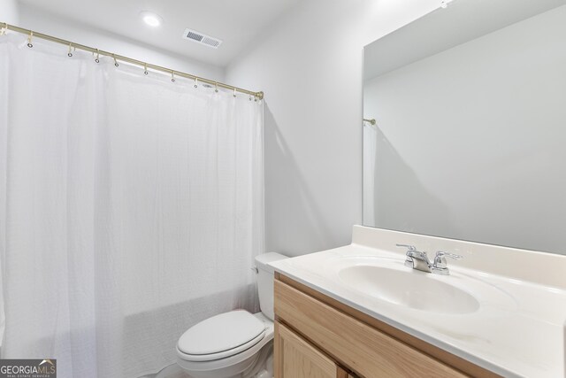 411 Riverclub Rd, Acworth, GA 30101 - full bathroom with toilet, vanity, recessed lighting, and shower / bath combo