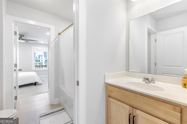 411 Riverclub Rd, Acworth, GA 30101 - ensuite bathroom with vanity, tile patterned floors, toilet, shower / bath combination with curtain, and ceiling fan