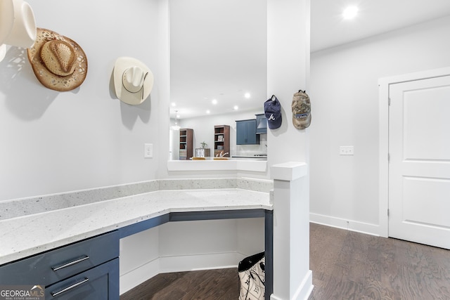 411 Riverclub Rd, Acworth, GA 30101 - kitchen with blue cabinets, recessed lighting, dark wood-style flooring, and light stone countertops