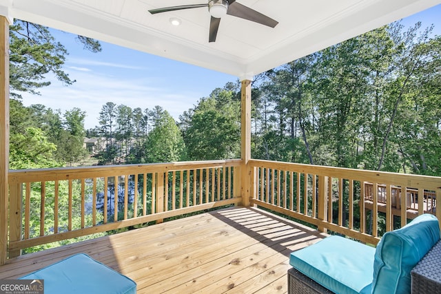 411 Riverclub Rd, Acworth, GA 30101 - deck featuring a ceiling fan and view of wooded area