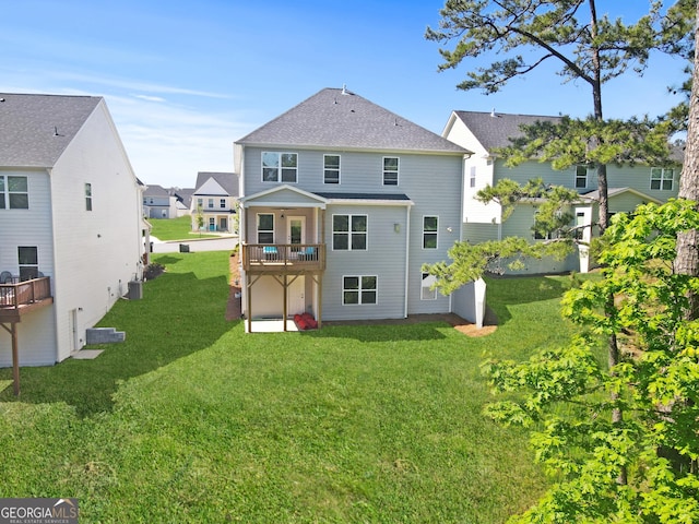 411 Riverclub Rd, Acworth, GA 30101 - rear view of property featuring a lawn and central AC unit