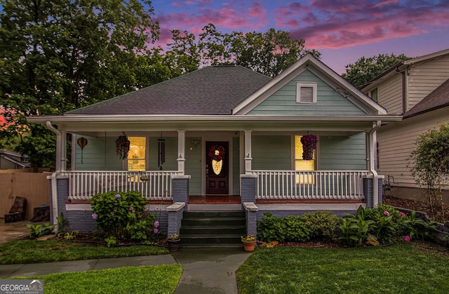 1292 Eubanks Ave, East Point, GA 30344 - bungalow-style home featuring covered porch and a shingled roof
