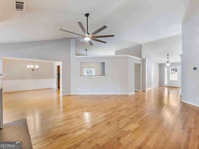 6439 Mossy Boulder Dr, Flowery Branch, GA 30542 - unfurnished living room with a ceiling fan, light wood-type flooring, a chandelier, and high vaulted ceiling