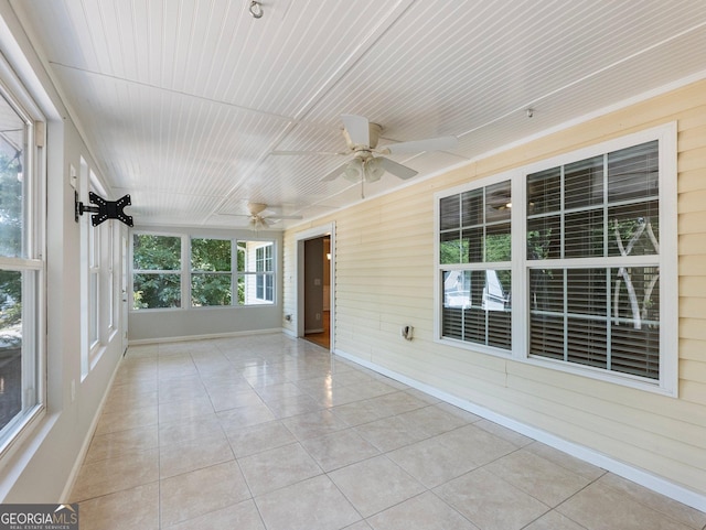 6439 Mossy Boulder Dr, Flowery Branch, GA 30542 - unfurnished sunroom with ceiling fan