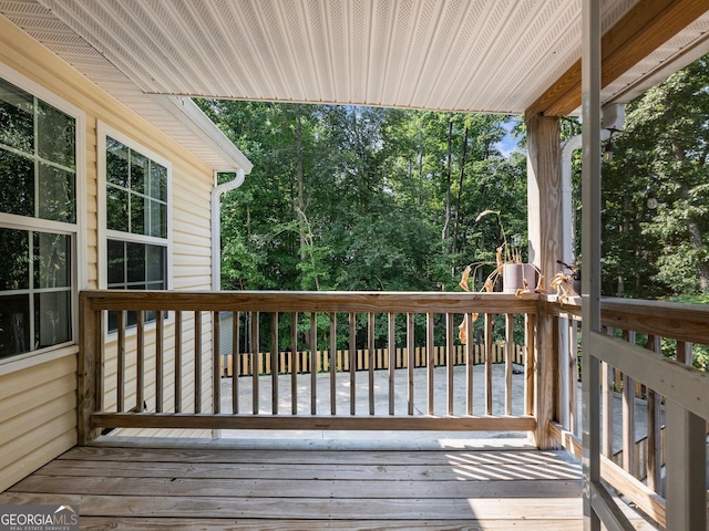 6439 Mossy Boulder Dr, Flowery Branch, GA 30542 - deck with view of wooded area