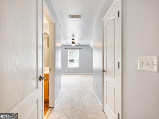 6439 Mossy Boulder Dr, Flowery Branch, GA 30542 - corridor featuring light carpet and baseboards