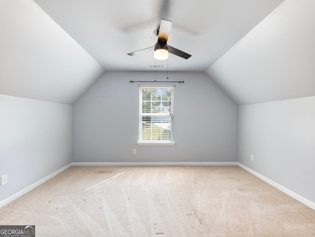 6439 Mossy Boulder Dr, Flowery Branch, GA 30542 - bonus room featuring vaulted ceiling, ceiling fan, and carpet