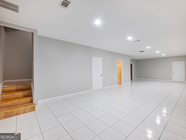6439 Mossy Boulder Dr, Flowery Branch, GA 30542 - spare room featuring recessed lighting, light tile patterned flooring, and stairs
