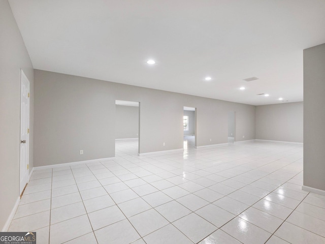 6439 Mossy Boulder Dr, Flowery Branch, GA 30542 - unfurnished room with light tile patterned flooring and recessed lighting
