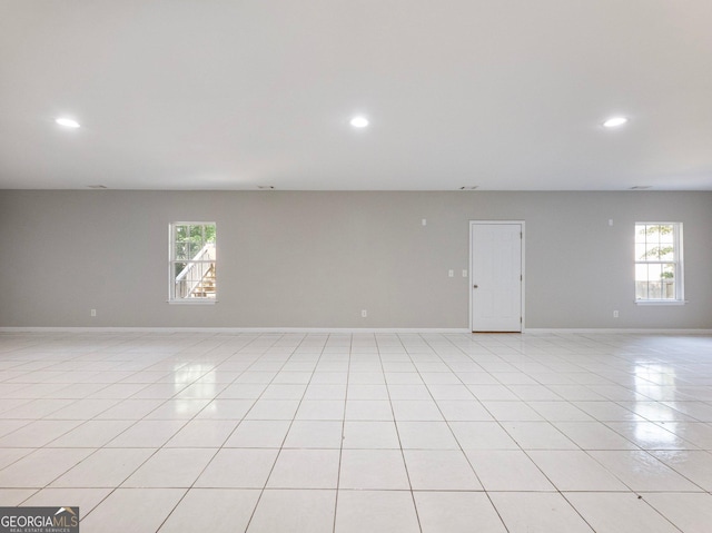 6439 Mossy Boulder Dr, Flowery Branch, GA 30542 - empty room with recessed lighting and light tile patterned floors