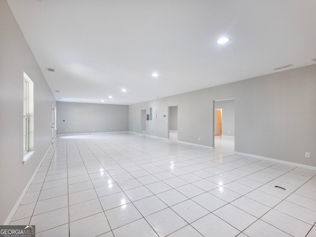 6439 Mossy Boulder Dr, Flowery Branch, GA 30542 - unfurnished room featuring light tile patterned floors and recessed lighting