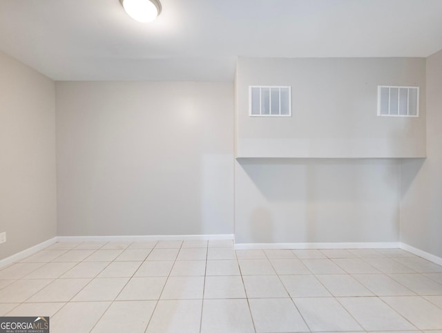 6439 Mossy Boulder Dr, Flowery Branch, GA 30542 - unfurnished room featuring tile patterned floors and baseboards