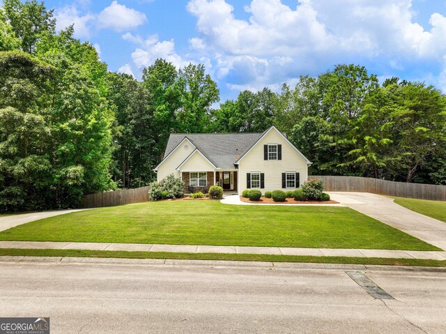 6439 Mossy Boulder Dr, Flowery Branch, GA 30542 - view of front of house featuring concrete driveway