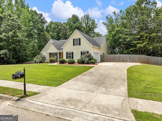6439 Mossy Boulder Dr, Flowery Branch, GA 30542 - traditional home featuring concrete driveway and an attached garage