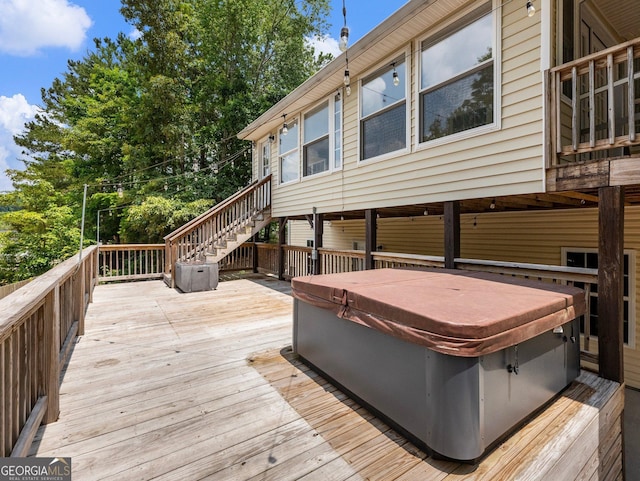 6439 Mossy Boulder Dr, Flowery Branch, GA 30542 - wooden terrace featuring a hot tub and stairway